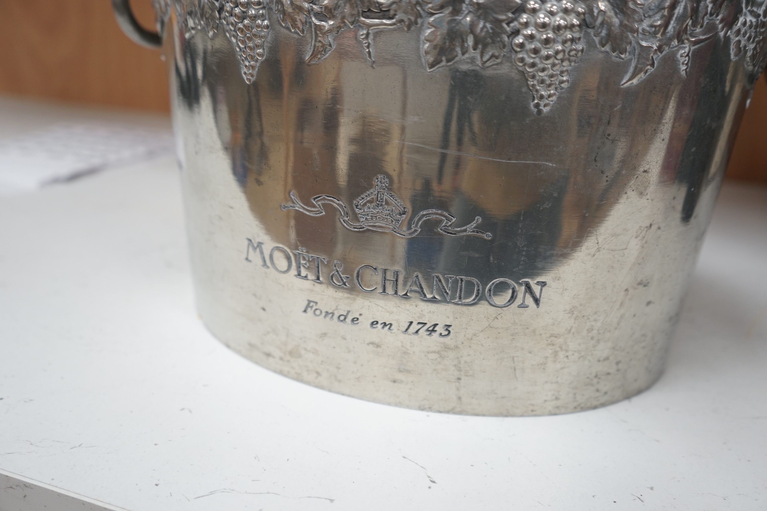 A Moet et Chandon wine cooler, 35cm wide. Condition - fair